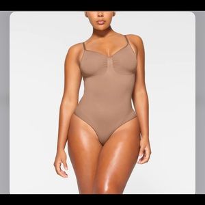 Skims Scult seamless body suit in Sienna S\M